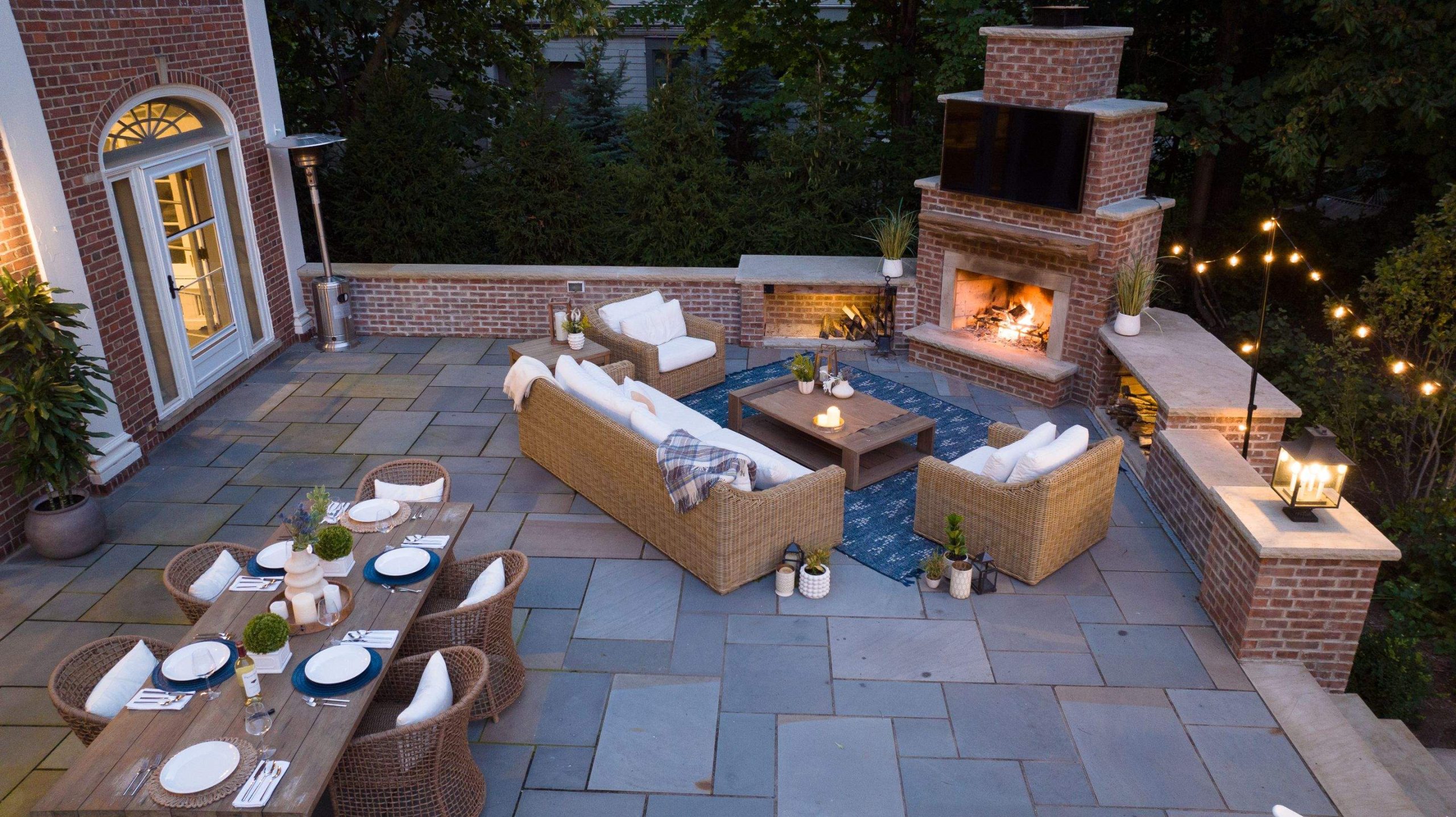 New Vista - Outdoor Kitchens Brick Wall Fireplace with Outdoor TV